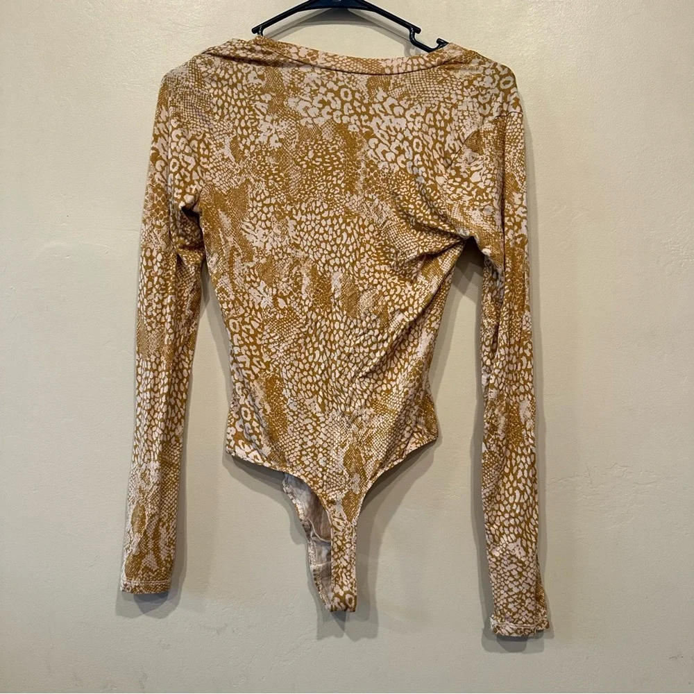 Free People X Revolve Gotcha bodysuit in Maize Intimately Free animal print